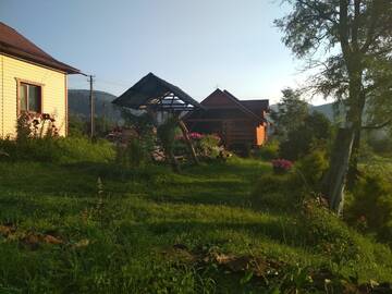 Фото номера Дом с 4 спальнями Дома для отпуска Під гіркою г. Krivopolʼye 27
